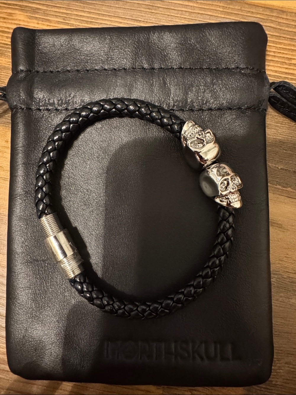 Men's Black Braided Leather Bracelet with Silver Skull Accents